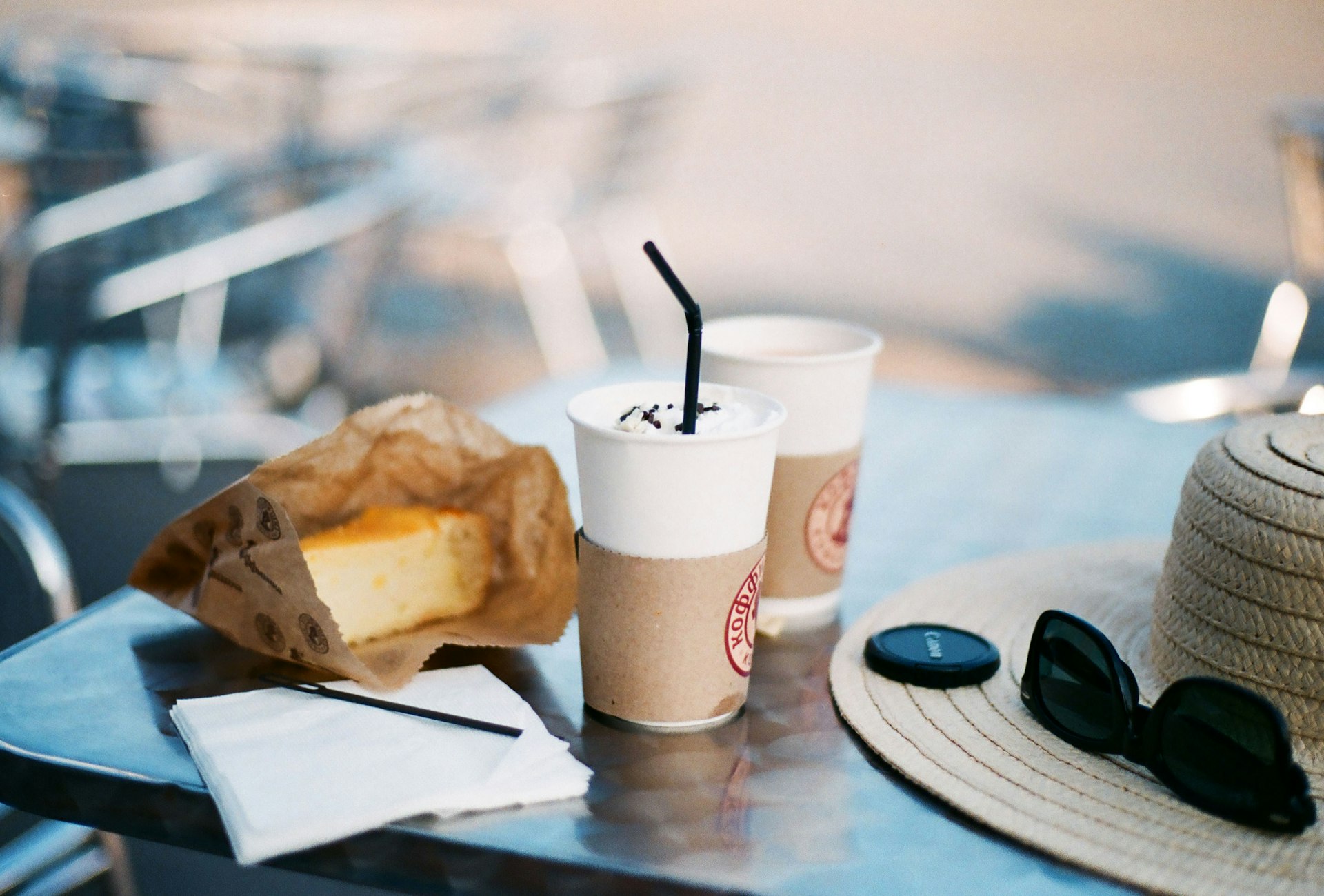 selective focus photography of bread and sip bottle on table